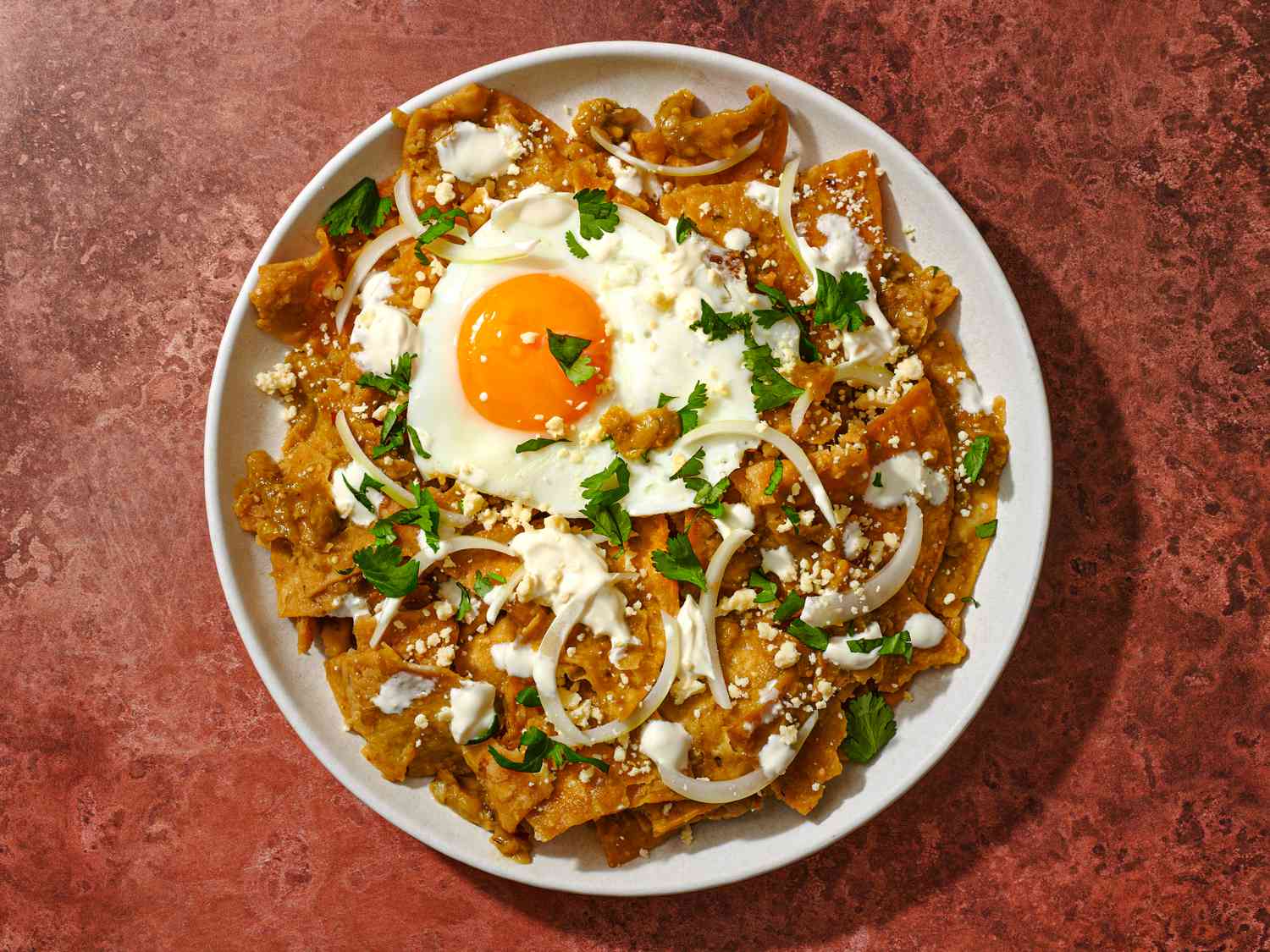 chilaquiles verdes fried eggs hero 01_1 d18b82d02fa54c92a05e66881e906814